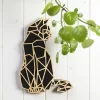 Escultura de gato geométrico en madera negra, diseño moderno y sostenible